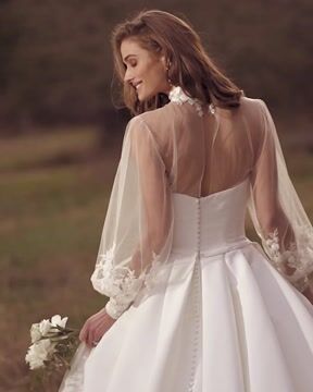 Elegant yet simple modest ballgown wedding dress with illusion neckline